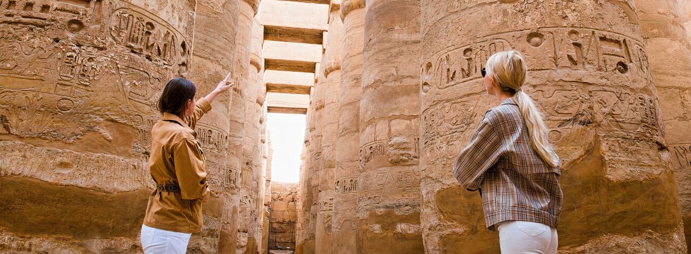 A-wonderful-picture-of-two-women-at-Karnak-Temple. Egypt Travel Safety